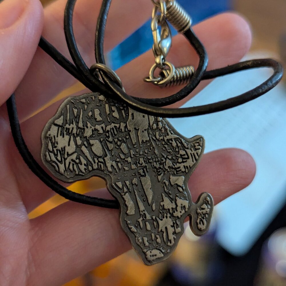 Resident Evil 5 Promo Necklace Africa (w/ kijuju scribbles all over) 2009